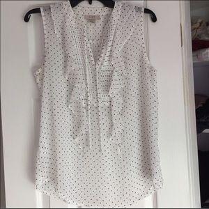 sleeveless sheer polka dot patterned blouse